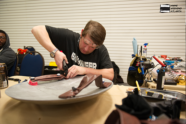 engineer volunteer fixing cosplay props